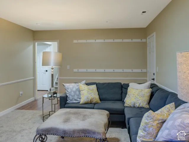 Family Room with Garge entry.  2 rows of coat hooks.