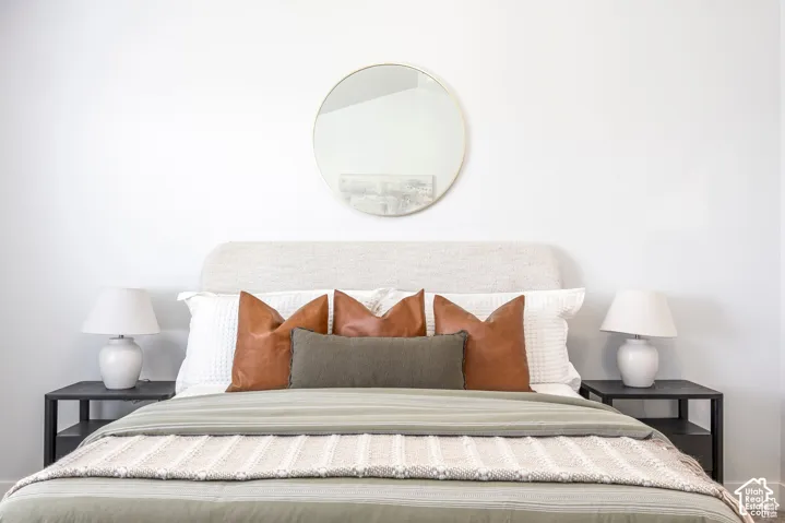 Built-in headboard featuring a neutral fabric