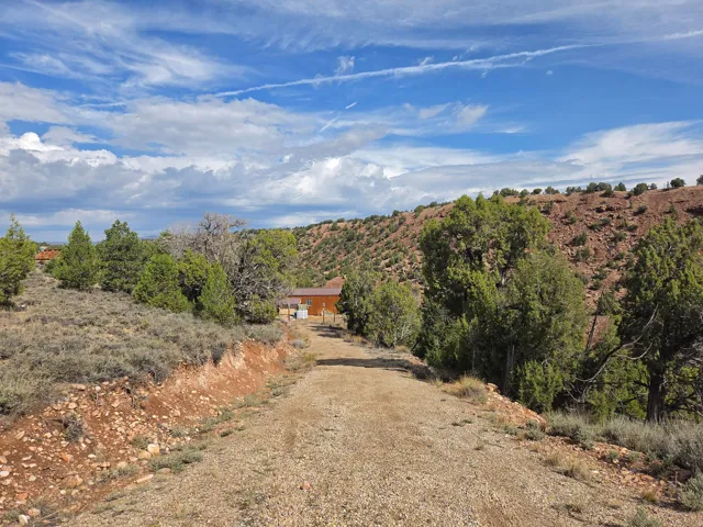 Spectacular mountain property with a creek & small off grid cabin/shed!