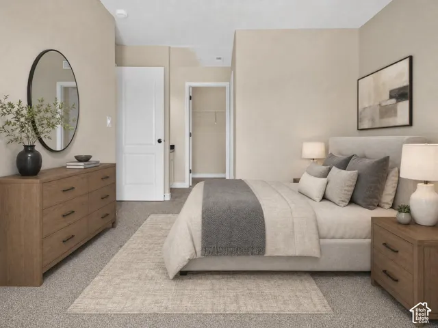 Carpeted flooring, white interior doors, and a built-in closet with wire shelving