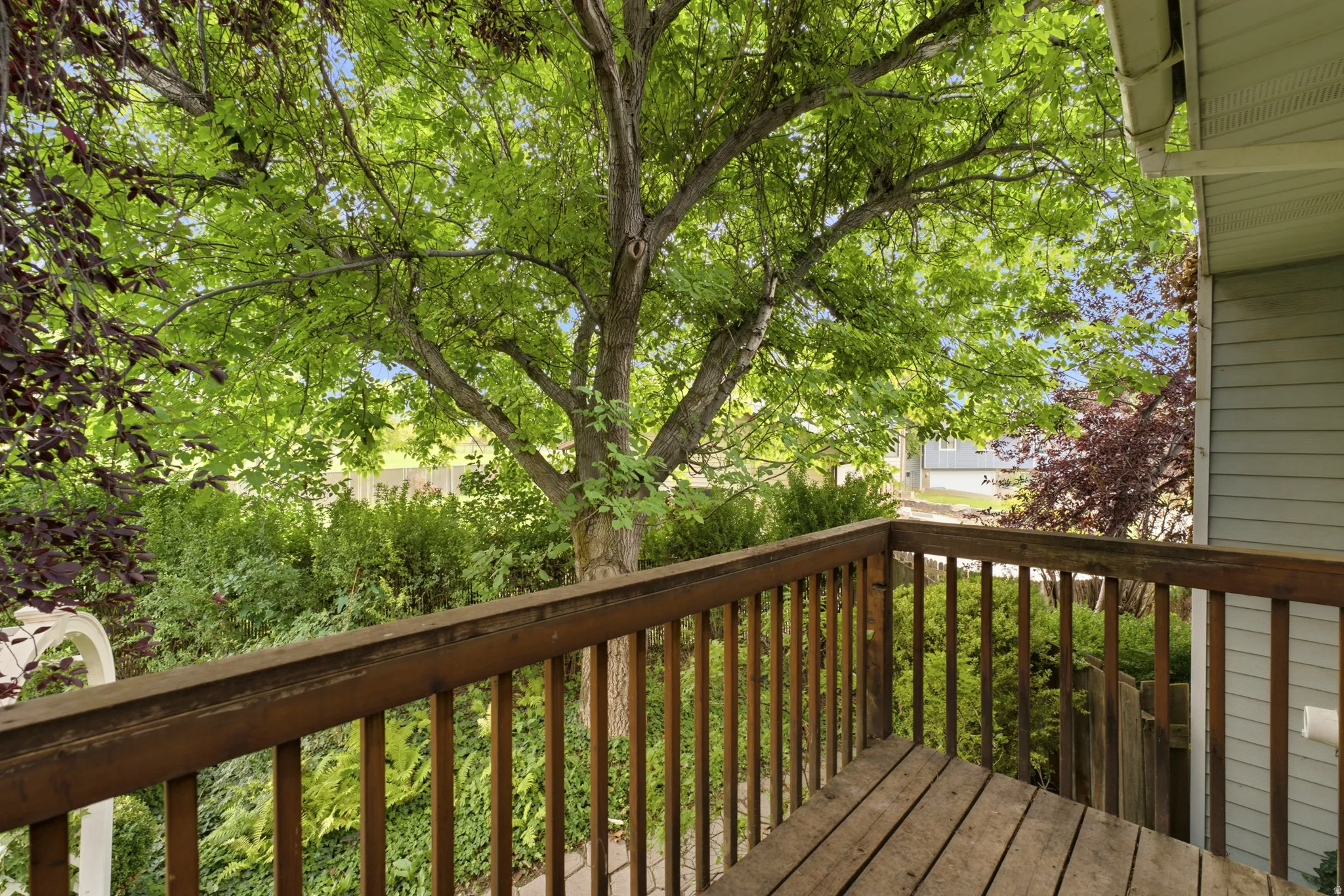 Wood-finish deck with a wooden railing
