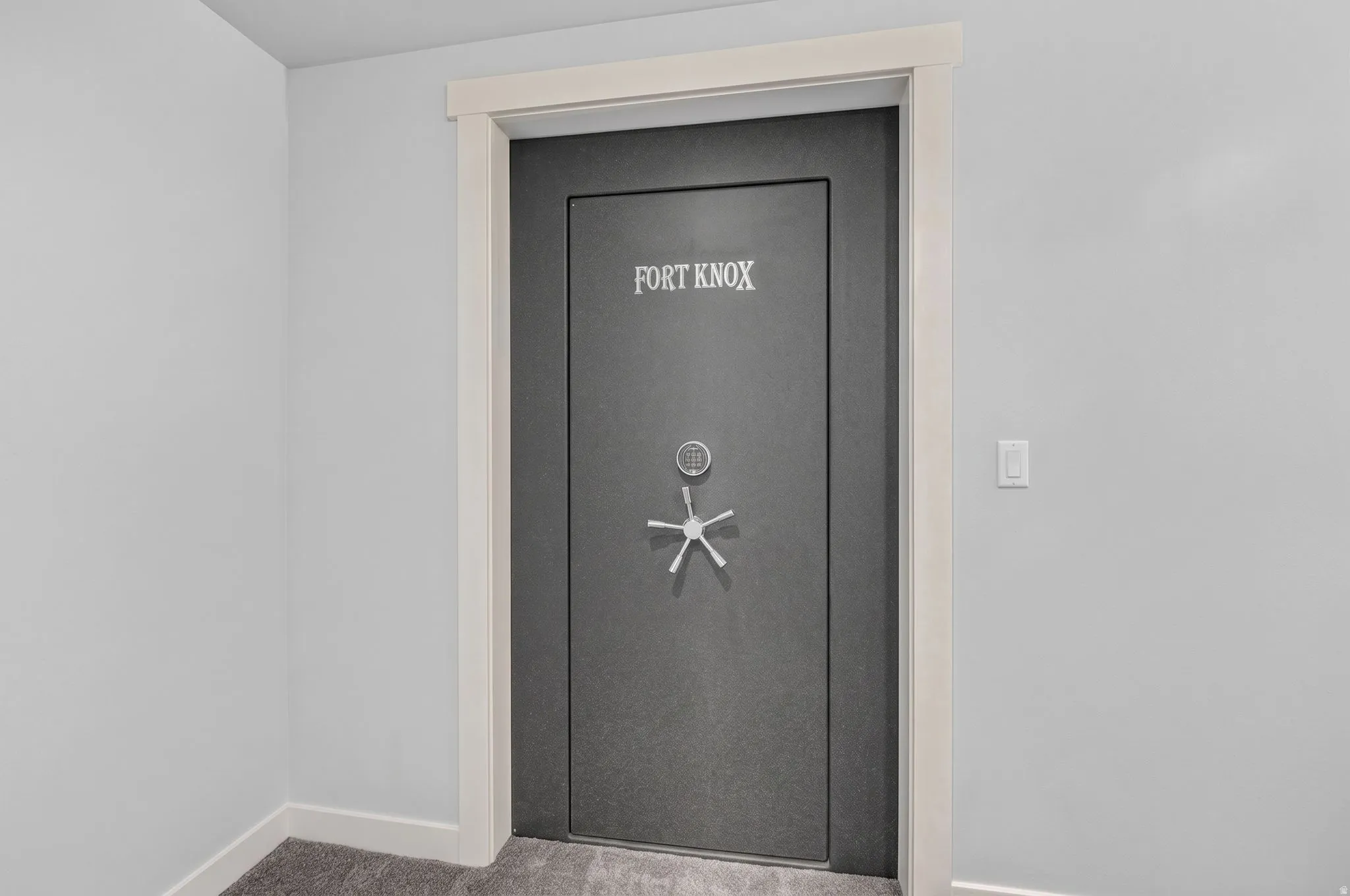 Secure vault door with combination dial and multi-point locking mechanism