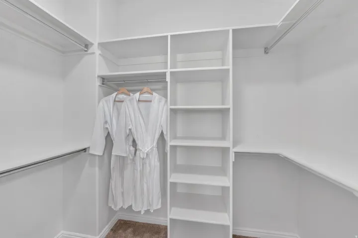 Built-in closet shelving and hanging rods