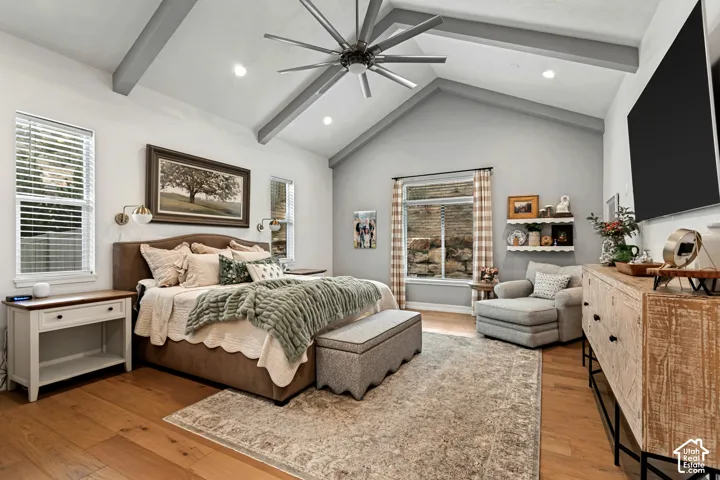 Main Floor Primary Bedroom w/ Vaulted ceiling w/ beams