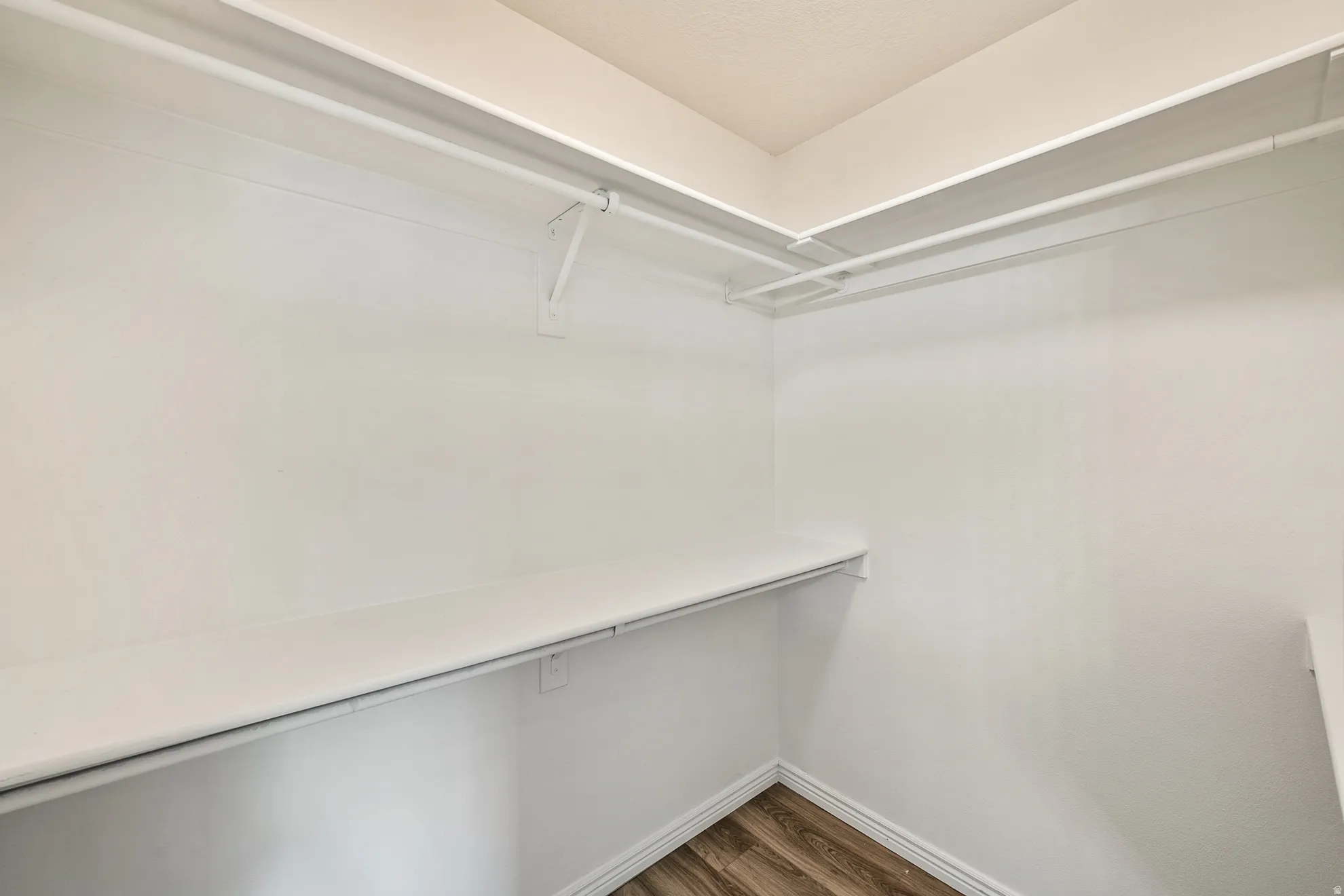 Integrated shelving and hanging rods