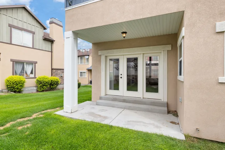 Covered Patio. Southwest Corner of Home. Back Entry. French Doors.