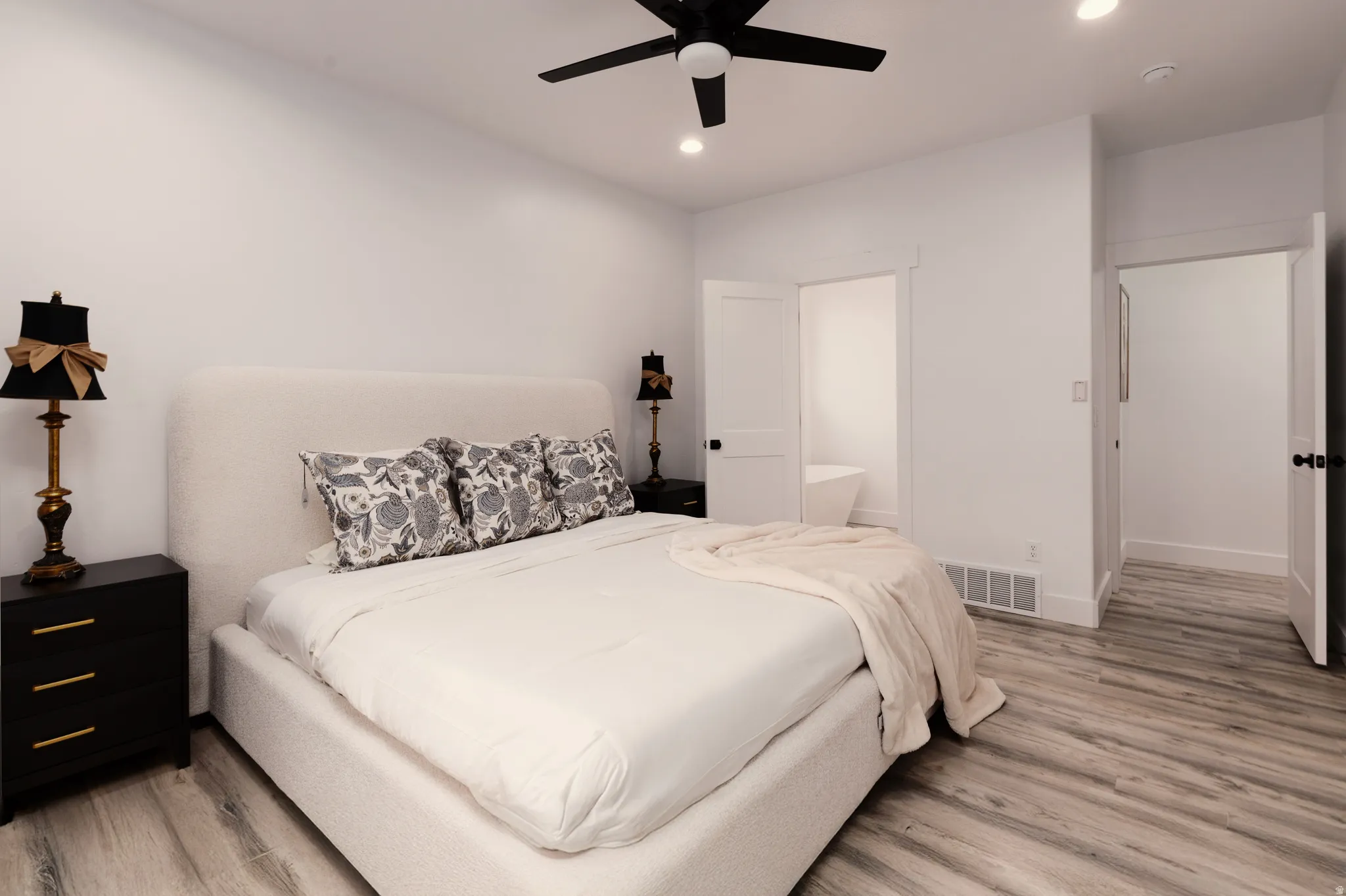 Wood-finish flooring with white walls