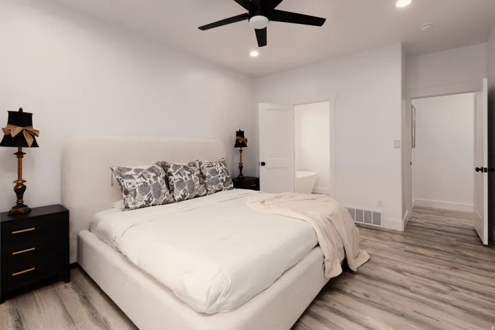 Wood-finish flooring with white walls