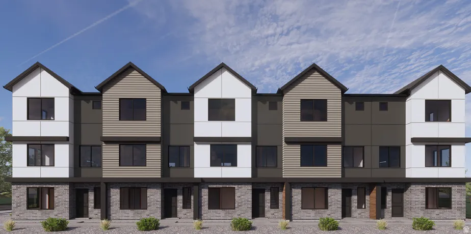 Modern townhome exterior featuring an appealing blend of stone and siding