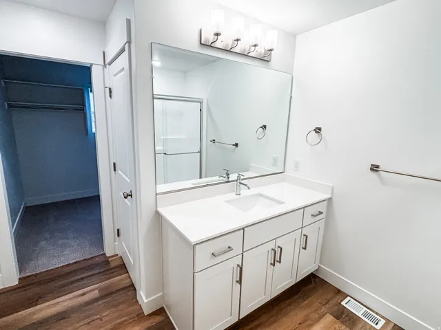 Primary bathroom will have a slightly different layout, with a single vanity sink and a walk-in shower.  Configuration may very slightly