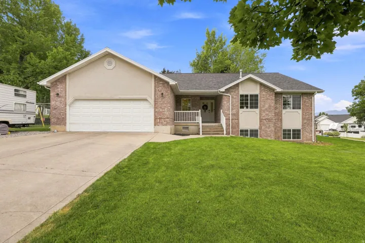 Brick & Stucco, Daylight Basement, Covered Front Porch, Corner Lot, Wonderful Layout