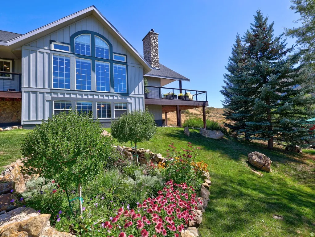 Fully landscaped with lots of mature trees and wild flowers