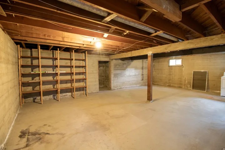 Concrete flooring and exposed ceiling beams