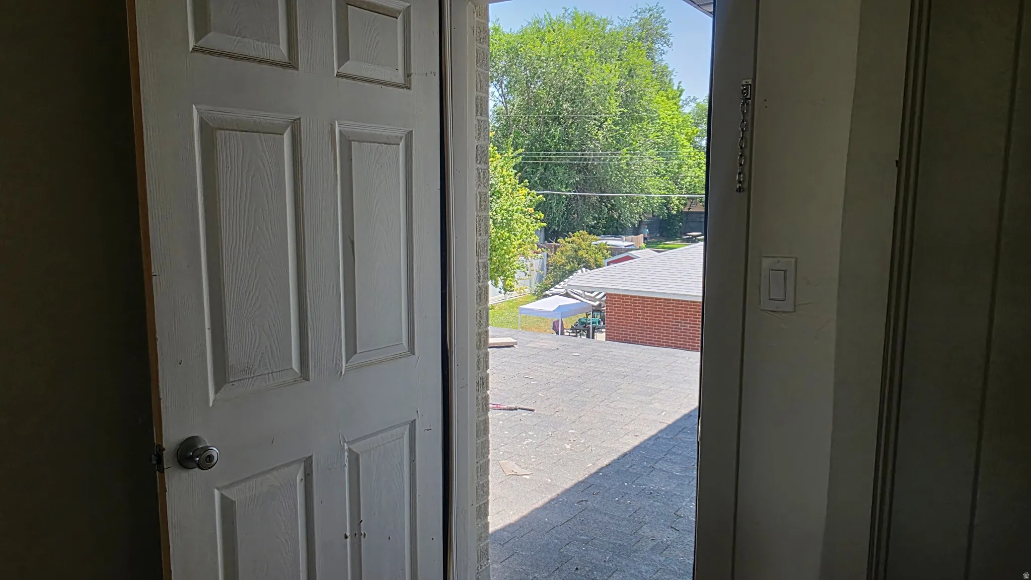 White paneled door with round knob hardware