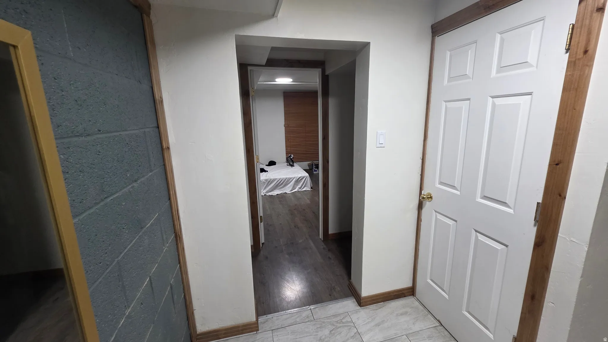 White paneled door with brass hardware