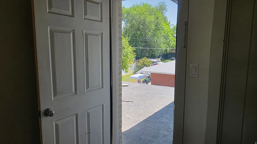 White paneled door with round knob hardware