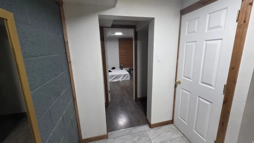 White paneled door with brass hardware
