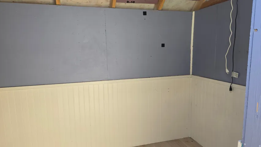 Inside Pink Studio, has electricity and windows.