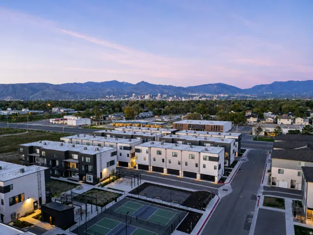 Modern townhome community featuring a contemporary architectural style and an organized street layout