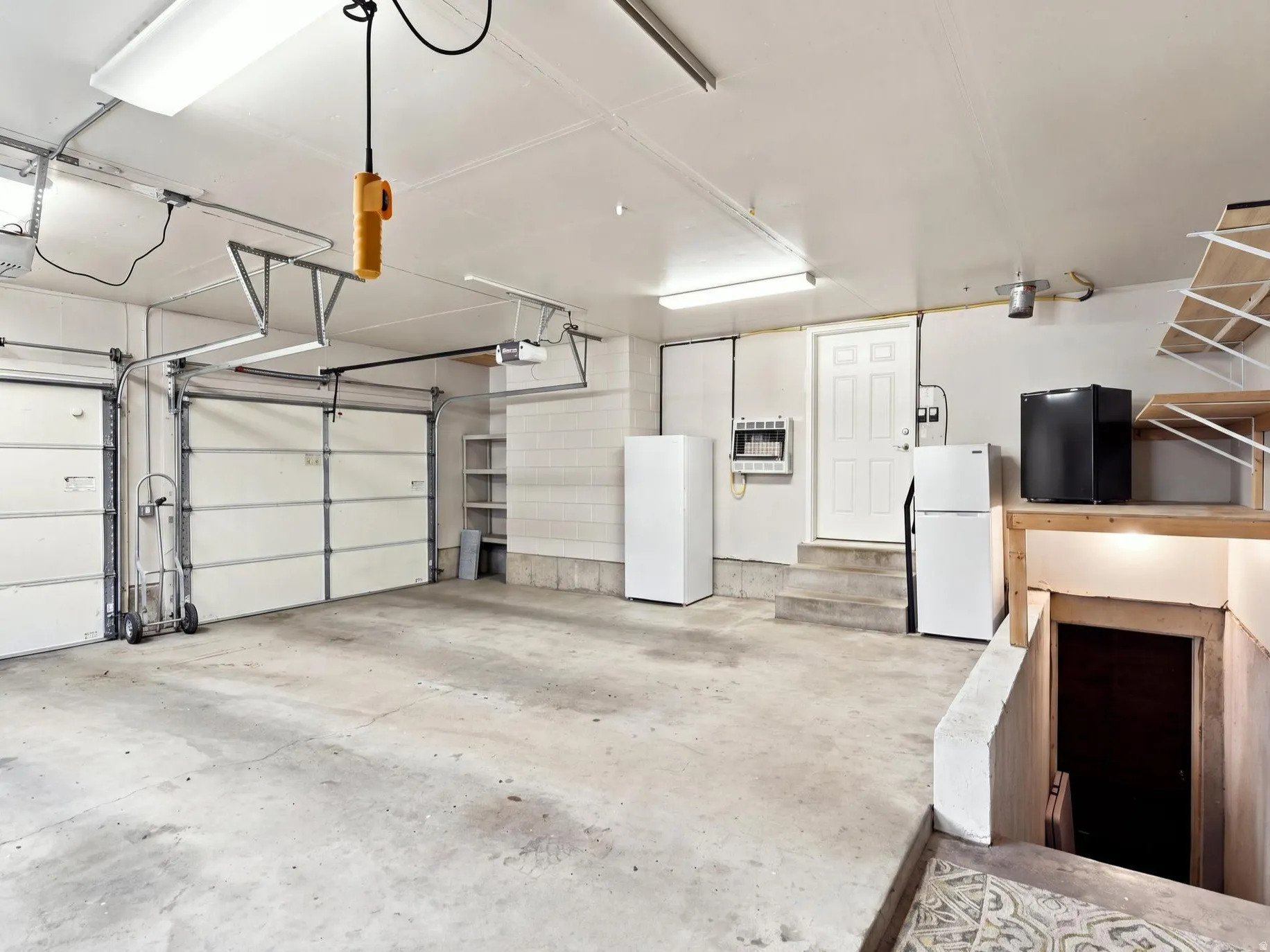 Oversized 2 car garage with basement entrance