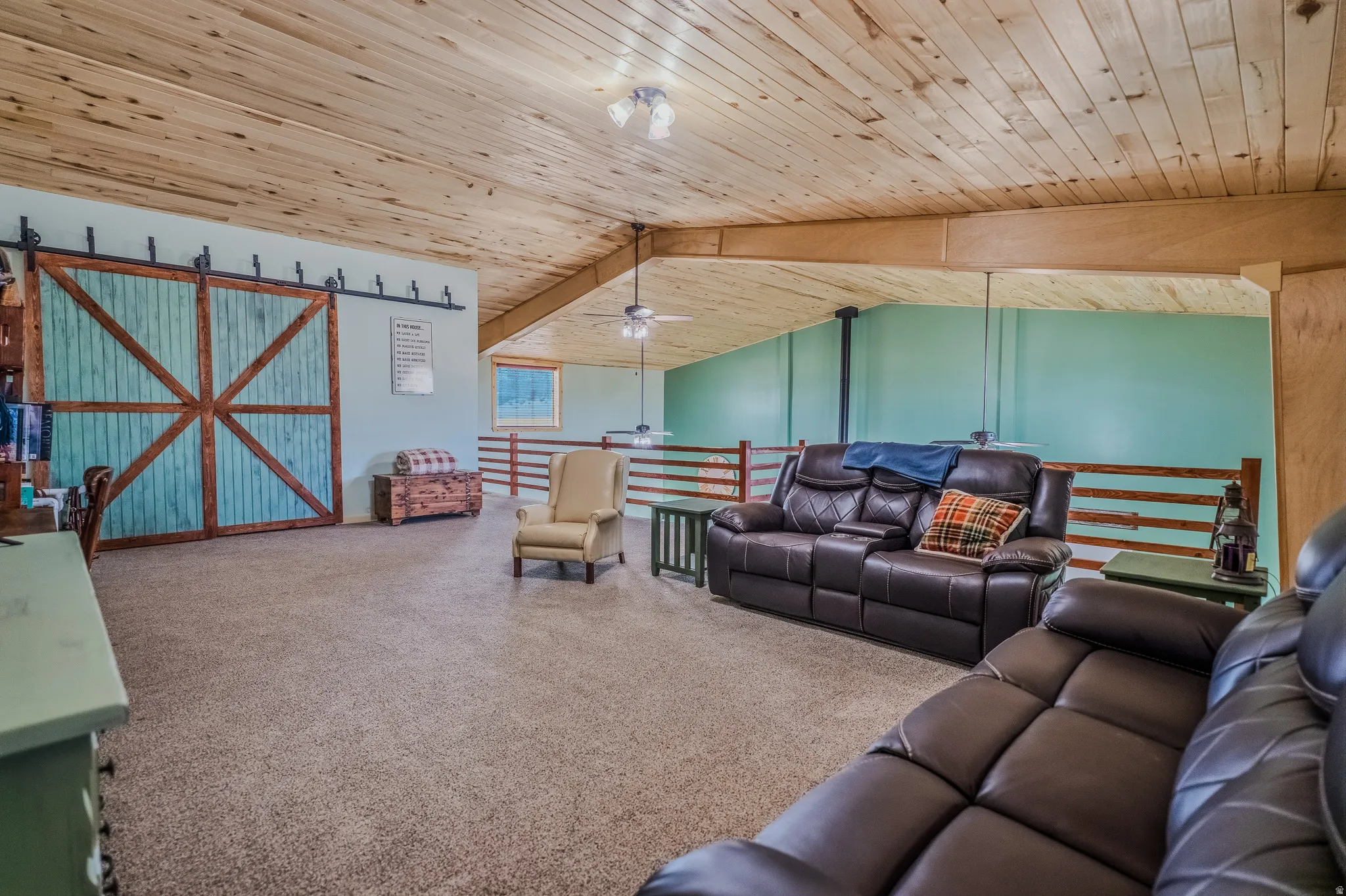 Vaulted wood-paneled ceiling with exposed beams
