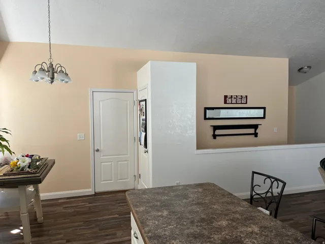 Wood-finish flooring with baseboard trim