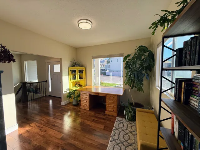 Wood-finish flooring throughout, with a recessed ceiling light fixture