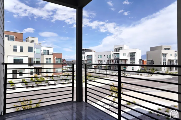Balcony with black metal railing