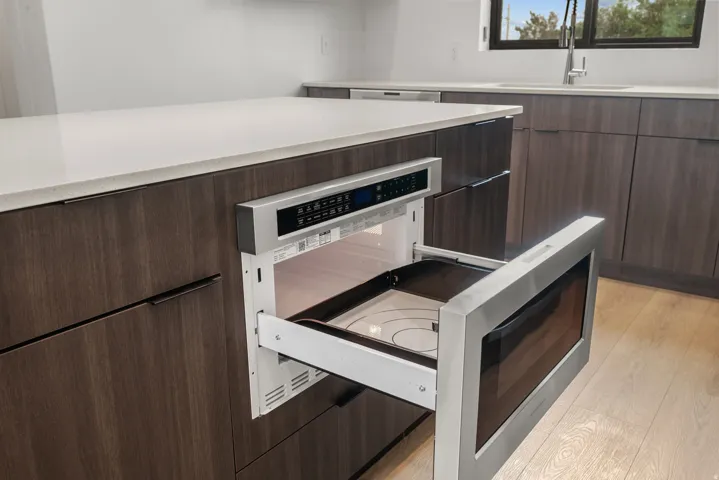 Integrated stainless steel drawer microwave