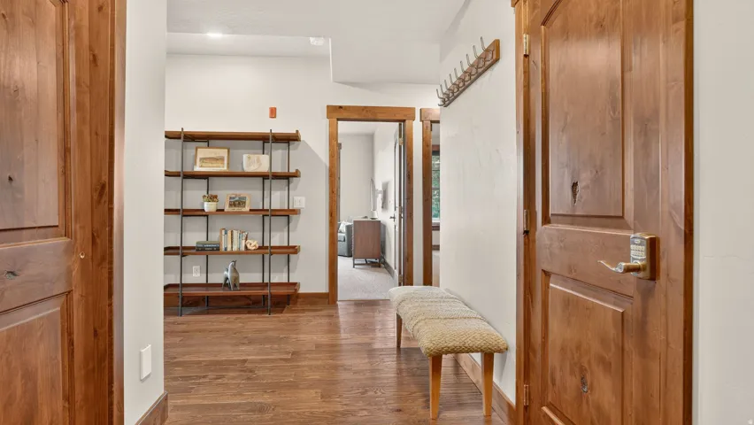 Wood-finish flooring, solid panel doors, and wood trim throughout