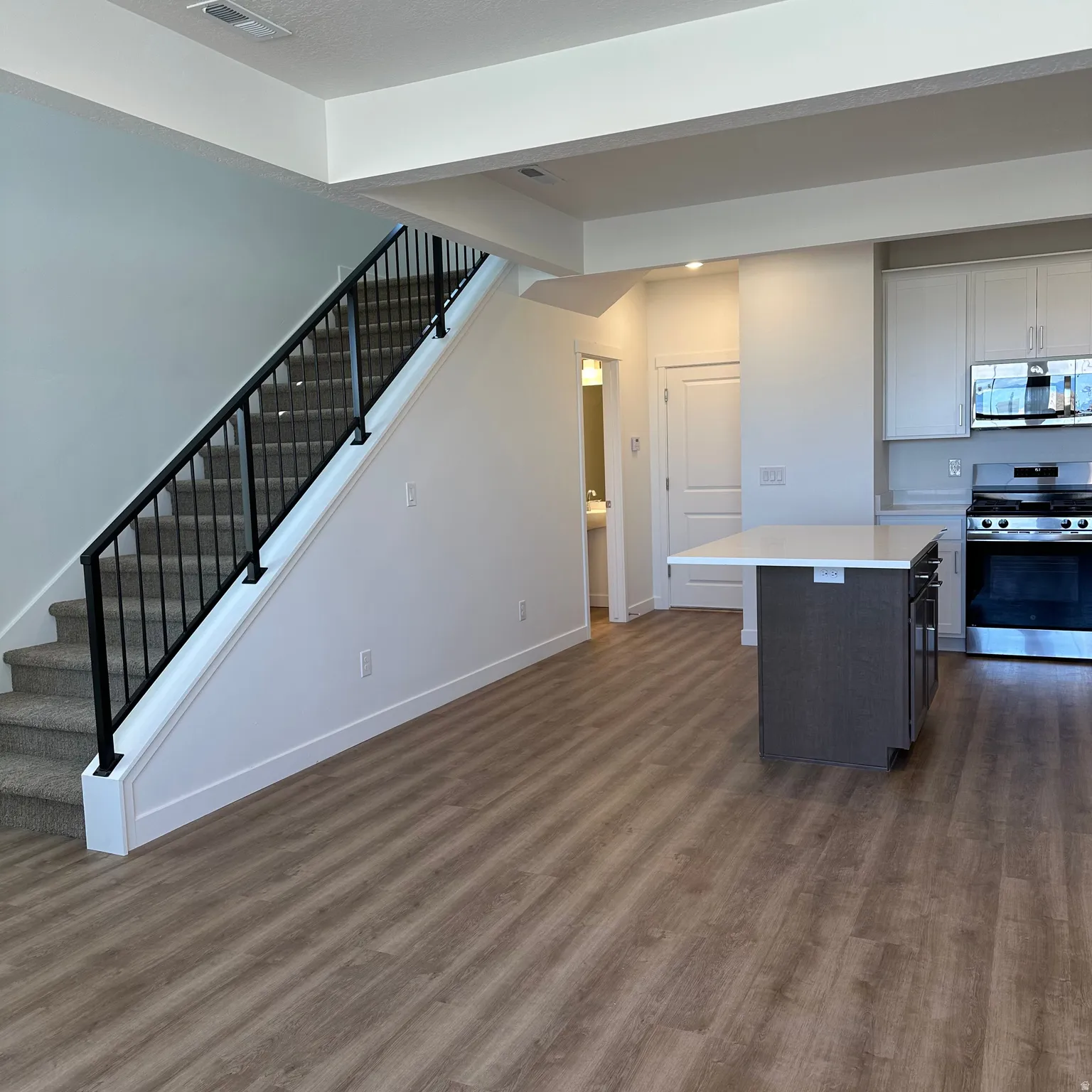 Wood-finish flooring throughout the main level