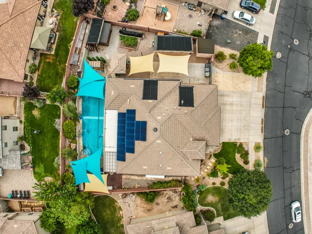 Tile roof with multiple solar panel arrays
