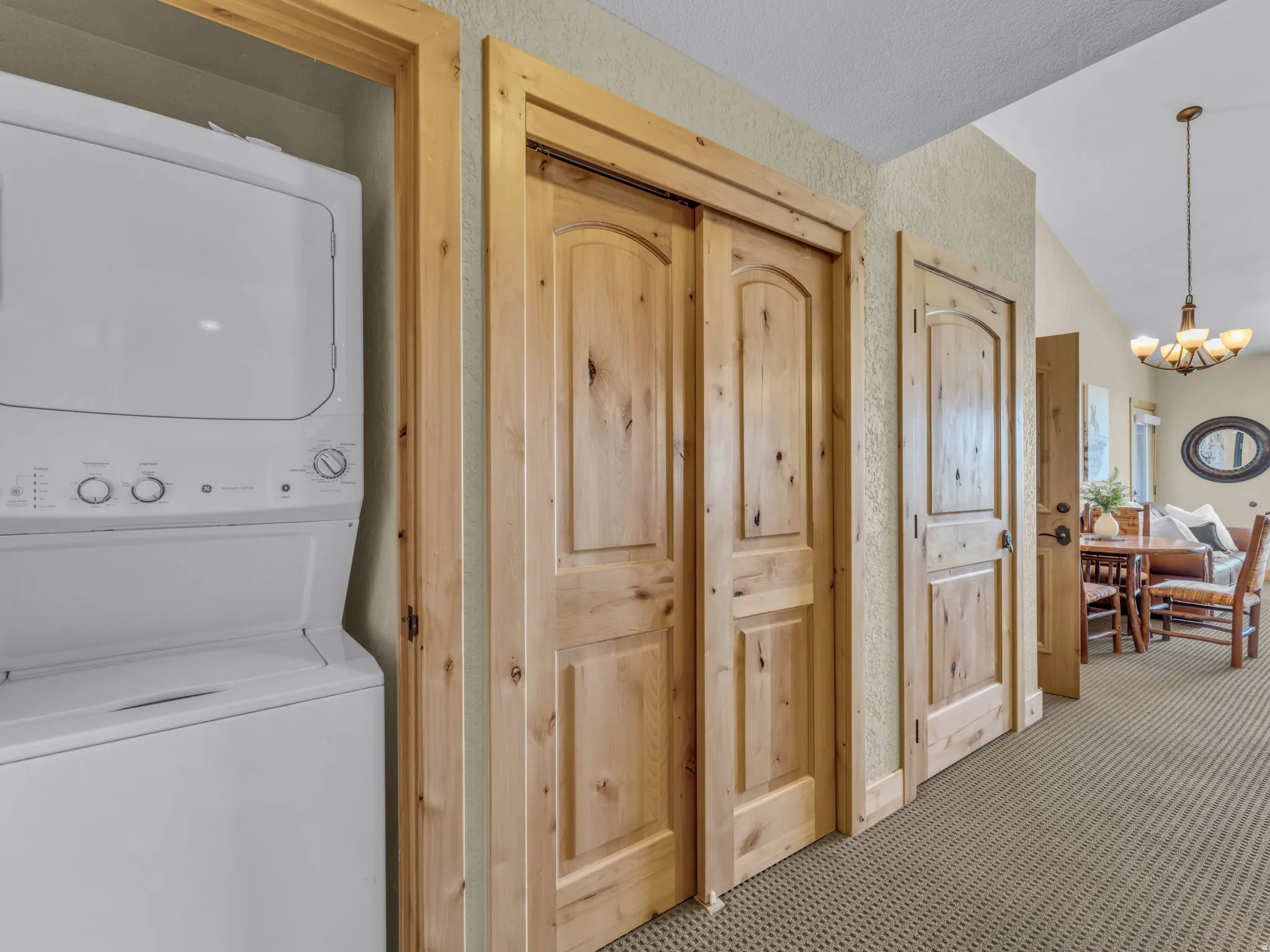 Stackable washer and dryer, wood-finish doors, and textured wall finish