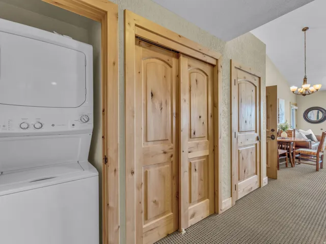 Stackable washer and dryer, wood-finish doors, and textured wall finish