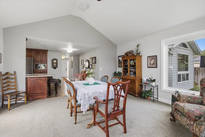 Vaulted ceiling with overhead lighting
