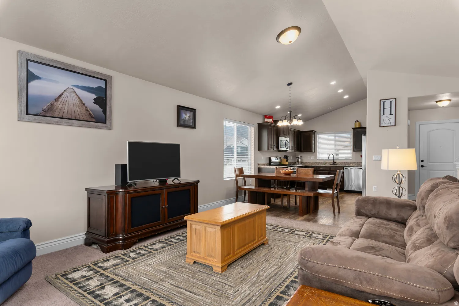 Vaulted ceilings complement the open-concept living area