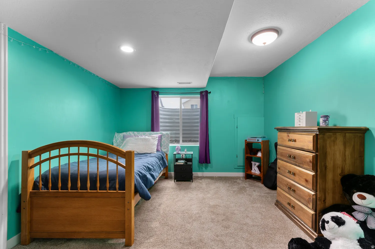 Carpeted flooring with egress window