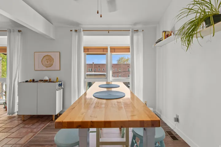 Wood-finish flooring with a light wood-tone table