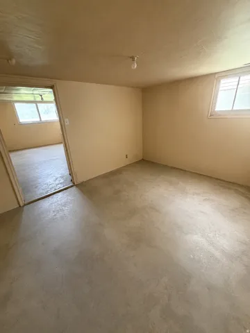 Concrete flooring throughout