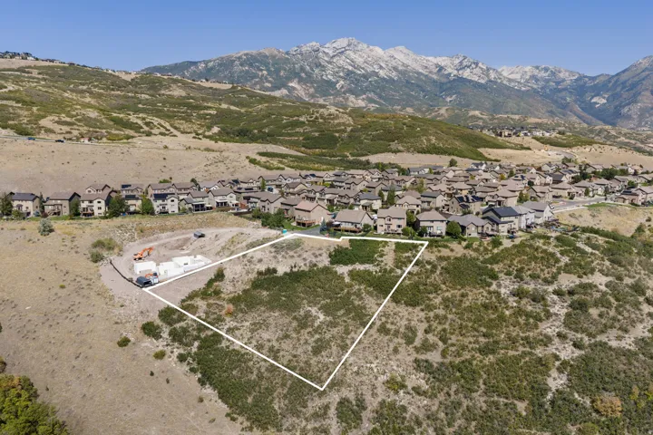 Expansive undeveloped lot with a mountain backdrop