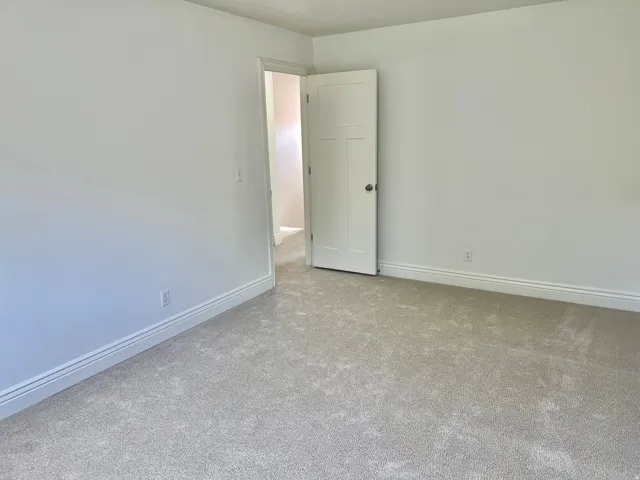 Neutral carpeting throughout
