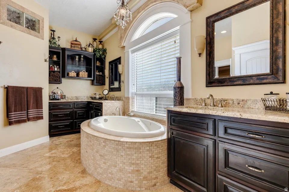 Deep espresso cabinetry with light-toned countertops