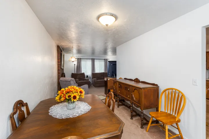 Carpeted flooring throughout, with neutral wall tones