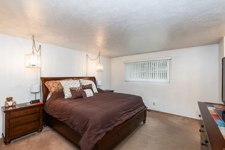 Neutral wall color with a textured ceiling