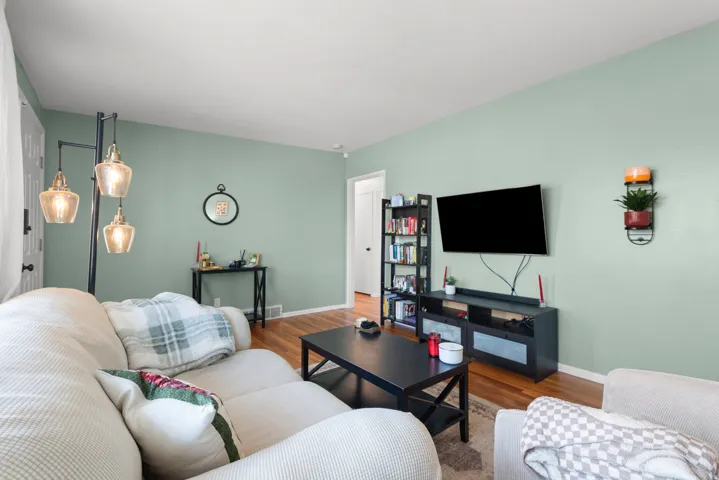 Hardwood flooring complemented by light-toned walls