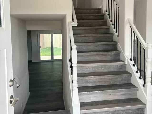 Wood-finish flooring throughout the main level