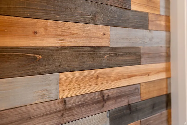 Accent wall featuring horizontal wood planks in varied tones