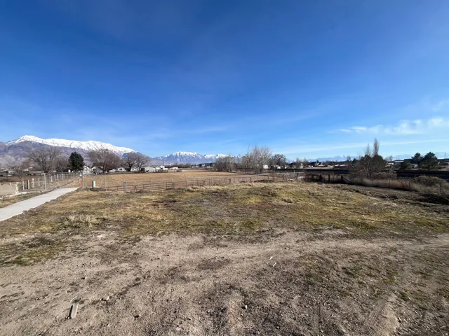 Expansive undeveloped land with a distant mountain backdrop
