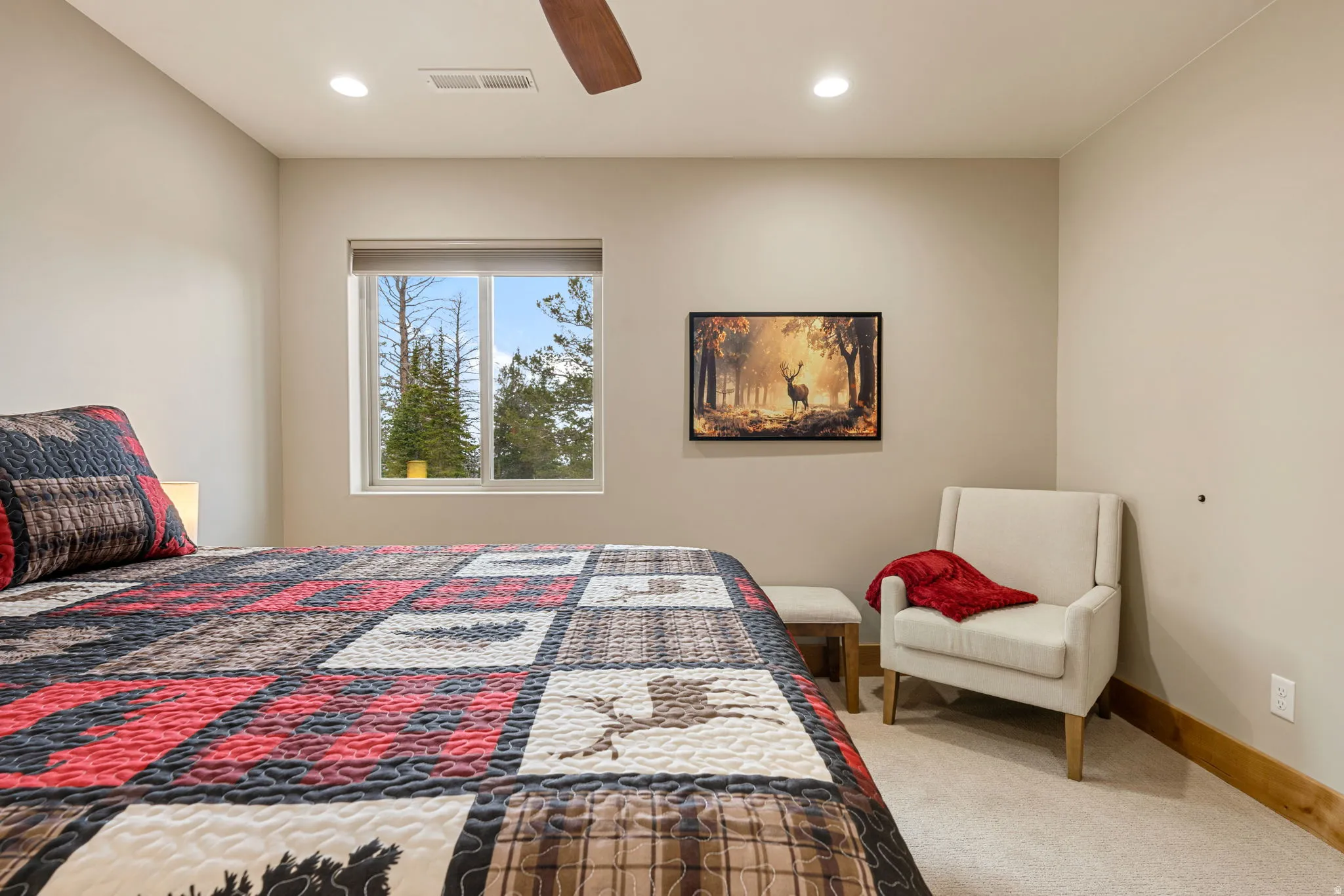Recessed lighting, ceiling fan, and large window