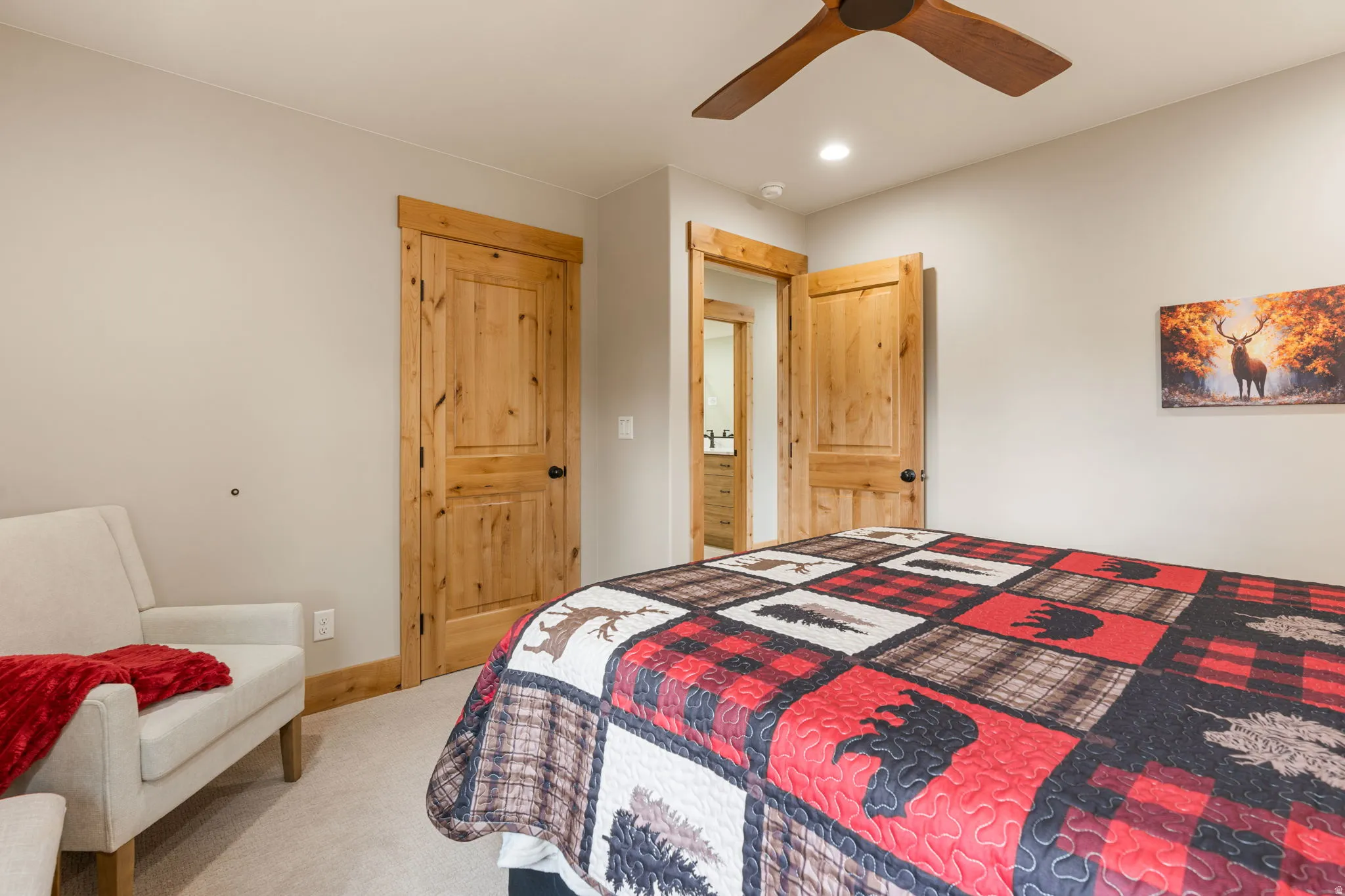 Wood-finish panel doors with dark hardware
